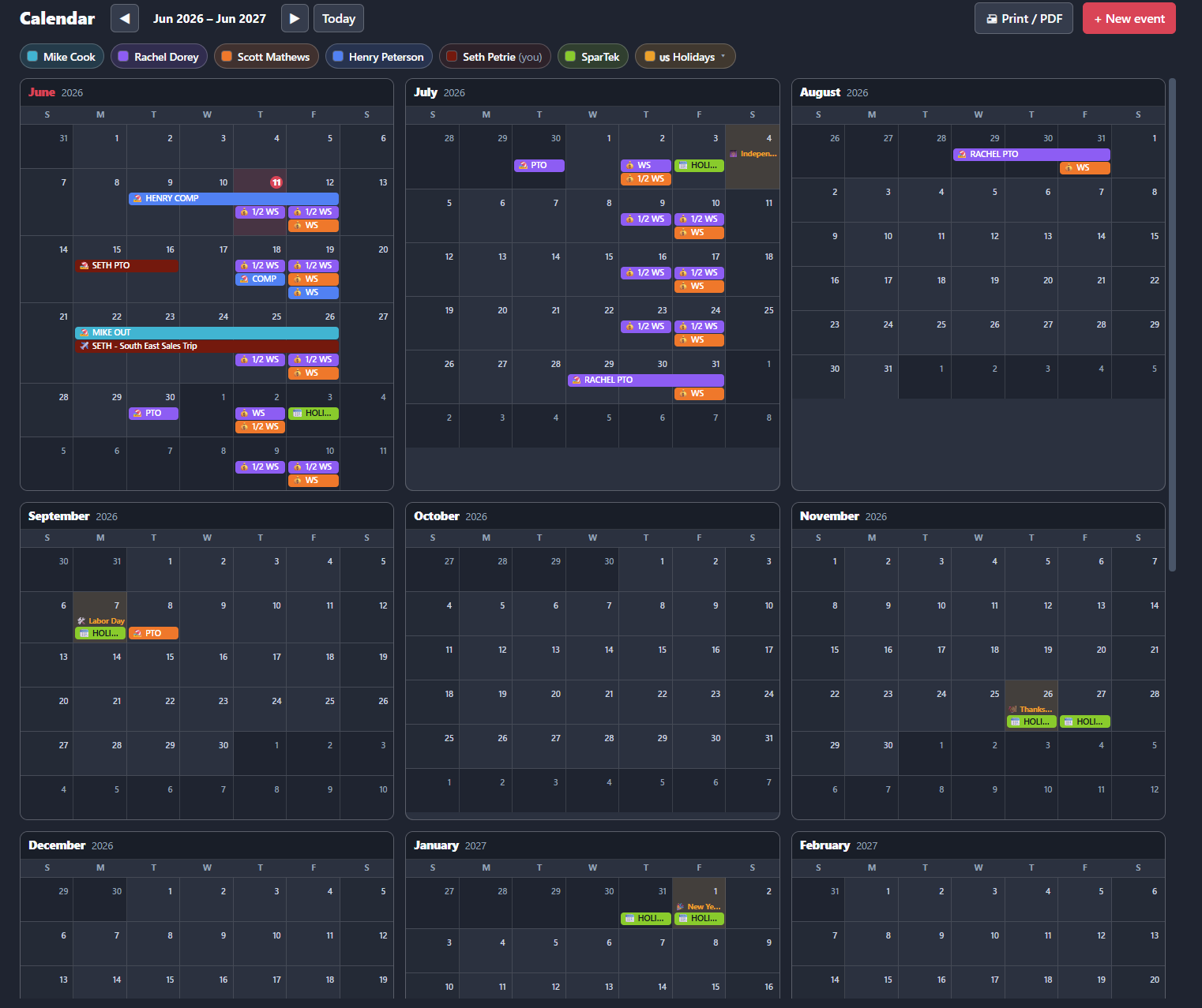 Command Calendar twelve-month view with color-coded events per person and holiday sets